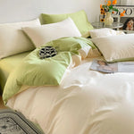 Housse de couette zippée en coton égyptien 400 fils couleur unie sur lit