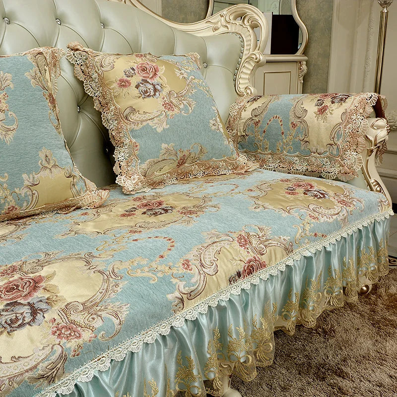 Un luxueux canapé orné de délicates fleurs et de motifs élégants dans des tons pastel, créant une atmosphère romantique et sophistiquée.