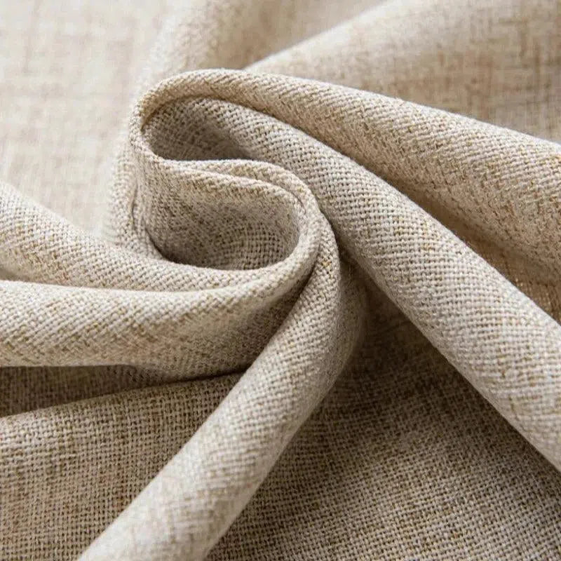 Texture naturelle et élégante de tissu beige, idéale pour la décoration d'intérieur et la création de vêtements sur mesure. Ce textile présente un tissage serré et raffiné, apportant une touche de sophistication à tout projet. Polyvalent et tendance, c'est le choix parfait pour des rideaux ou des housses de coussins stylés.