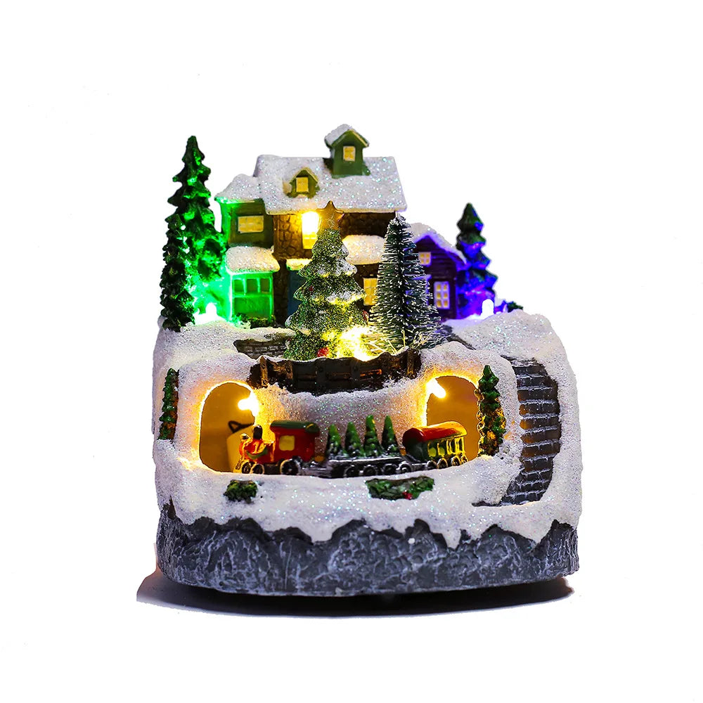 Effet neige en action sur la maison miniature de village