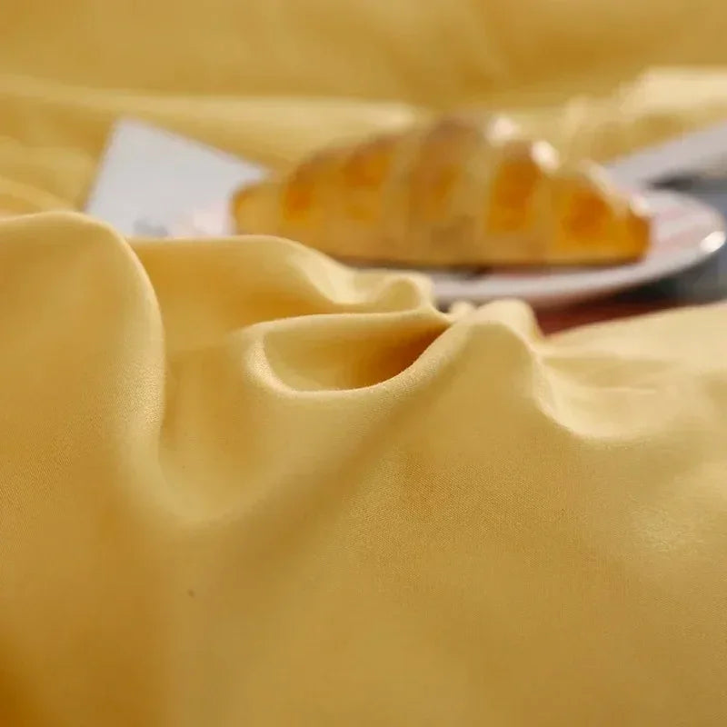 Détail du tissu en coton 100% de la housse de couette jaune