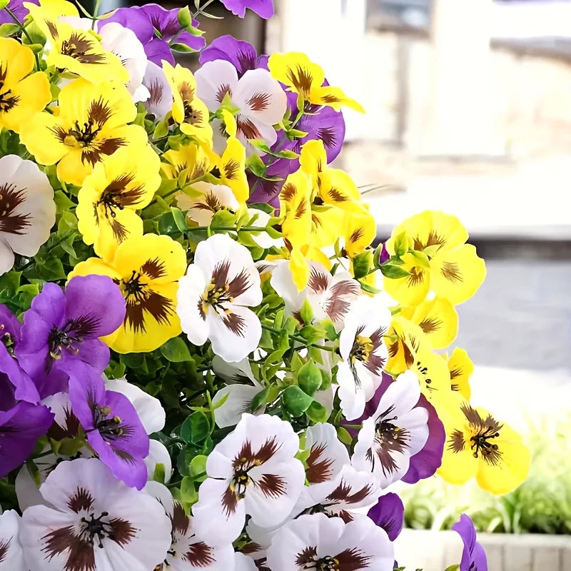 Détail d'une branche de fleur artificielle primula beige