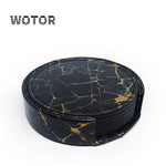 Dessous de plat rond en marbre noir et or aux motifs dynamiques, parfait pour protéger vos surfaces des brûlures et des taches.