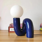 Lampe de table rouge avec abat-jour en verre dépoli