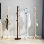Porte-manteau vertical couleur blanc dans une chambre