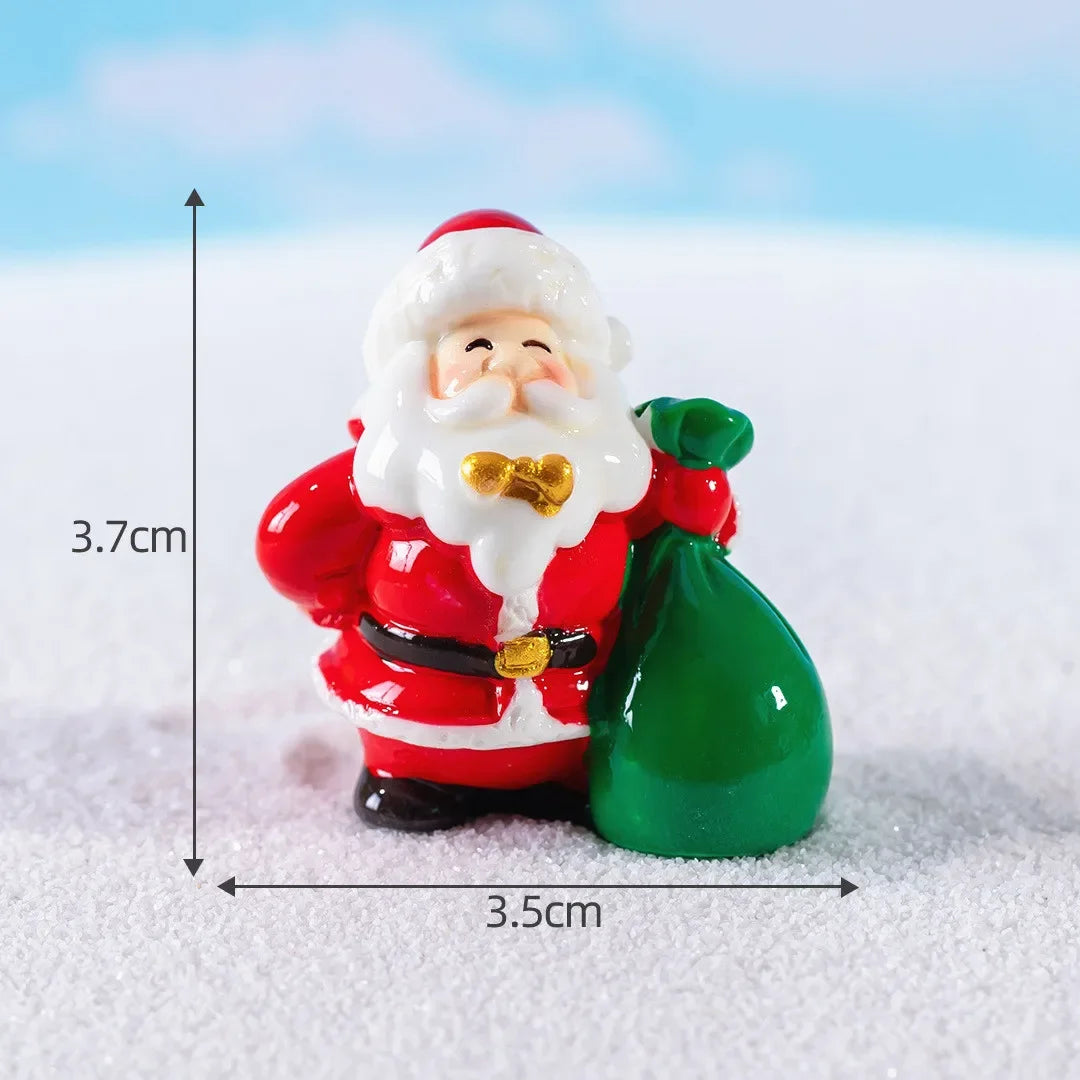 Figurine de Père Noël en résine couleur bourgogne sur cheminée de Noël