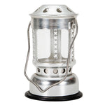 Lanterne à bougie portable en alliage aluminium couleur rouge éclairant une soirée en extérieur