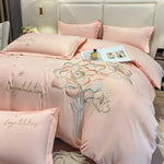 Parure de lit 4 pièces en coton brossé blanc sur lit 160x200