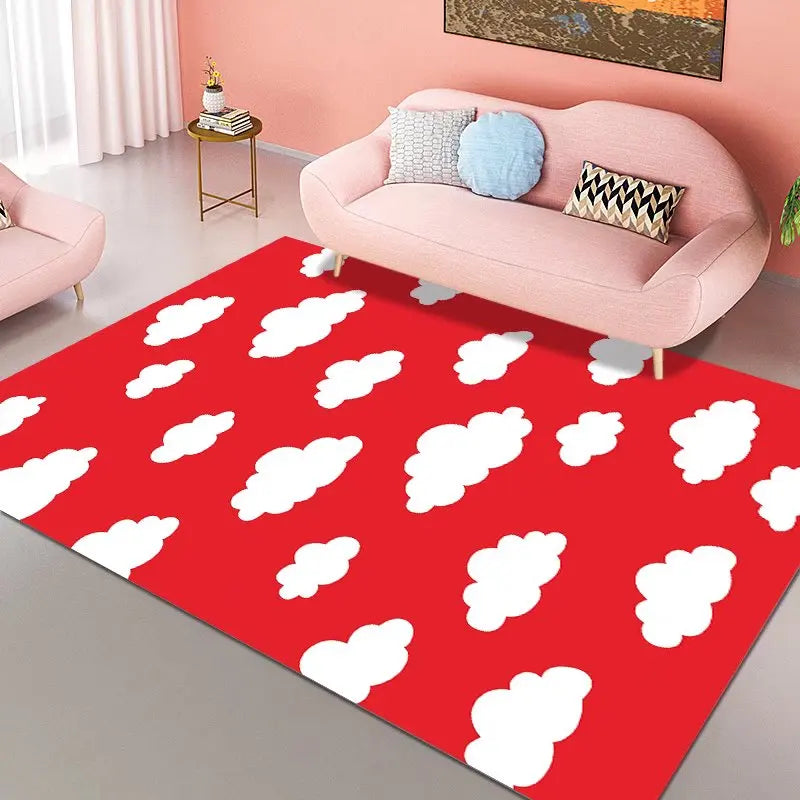 Un joli tapis rouge avec des nuages blancs stylisés crée une ambiance chaleureuse et ludique dans ce salon moderne.