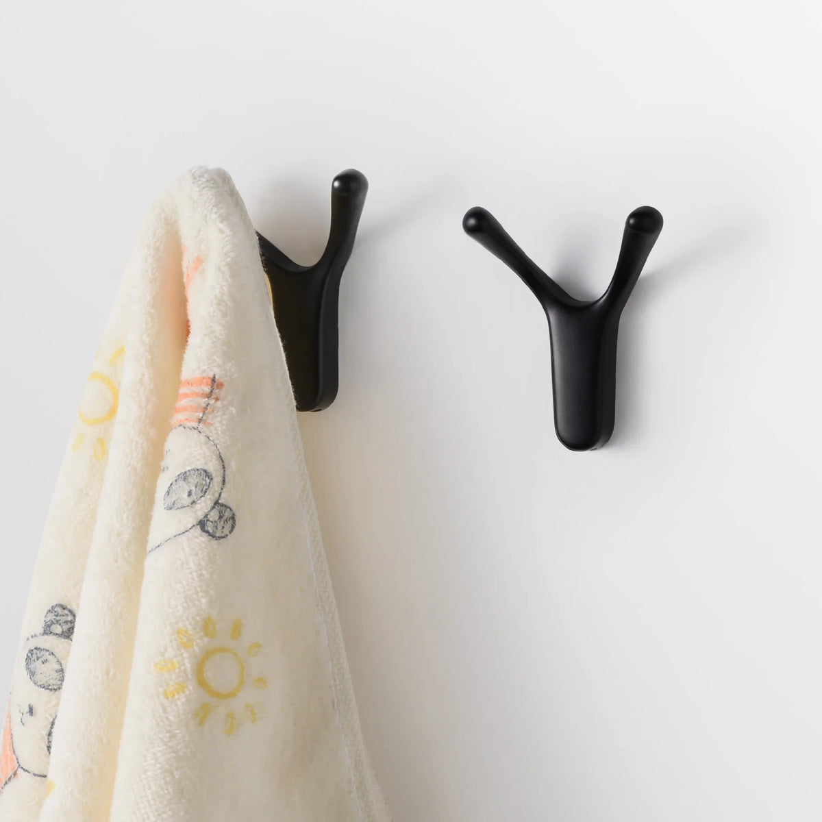Crochet en Y pour manteau et accessoires