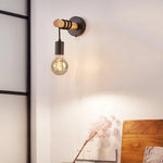 Comparaison des couleurs blanche et noire de l'applique murale en bois
