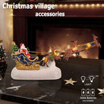 Traîneau du Père Noël avec renne LED bleu sur table de Noël décorée