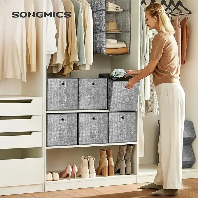 Boîtes pliées à plat pour un rangement compact et facile
