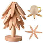 Ensemble de dessous de plat en bois forme arbre sur table de cuisine