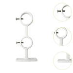 Installation du support mural double rideau dans une chambre