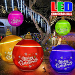 Boule de Noël géante gonflable 60cm avec éclairage LED dans un jardin