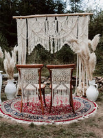 Rideau macramé utilisé comme fond de mariage