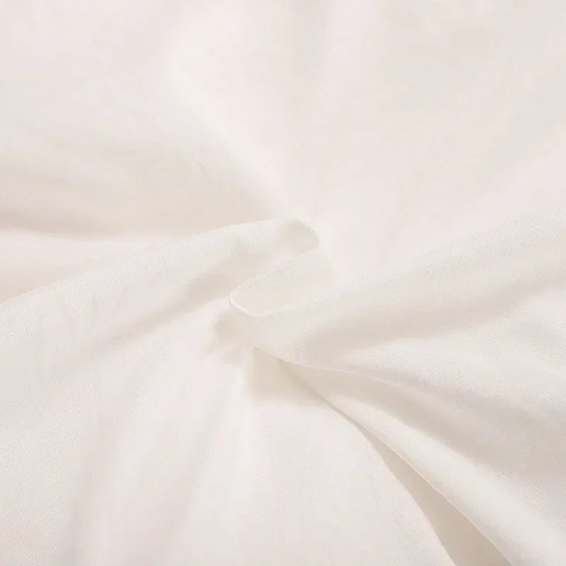 Parure de lit violette pour chambre moderne