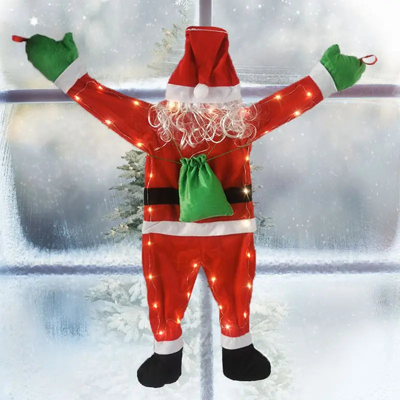 Père Noël en velours couleur olive sur porte d'entrée