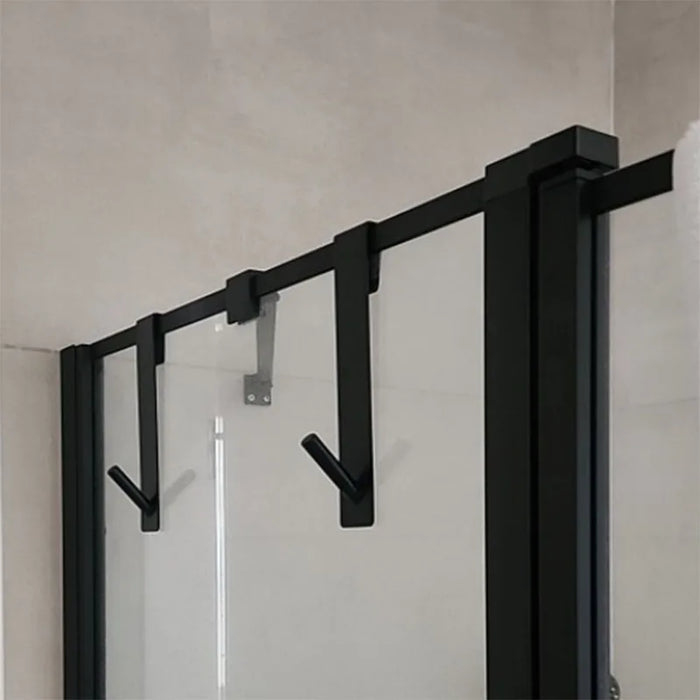 Porte-serviettes de douche en acier inoxydable sur porte vitrée