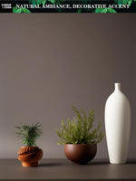 Pot de fleur design vert sur étagère