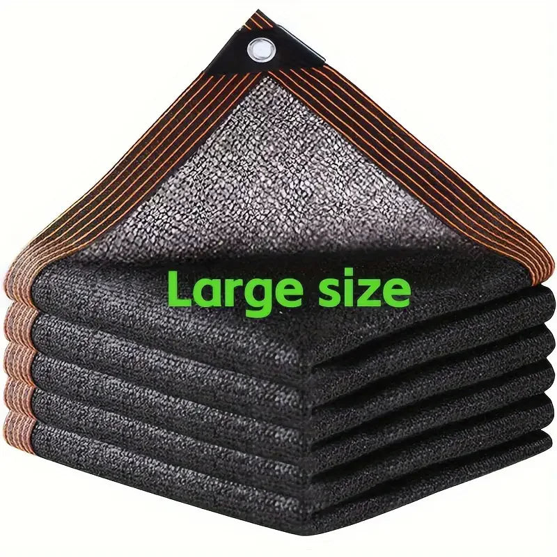 Voile d'ombrage 4x4 m noire installée sur terrasse