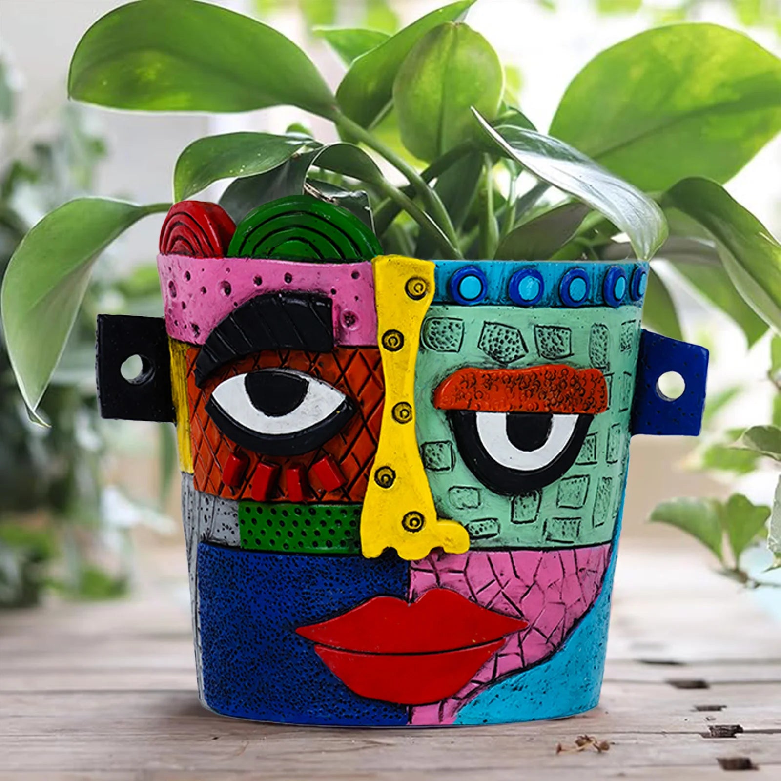 Cache-pot visage abstrait coloré en résine peint à la main