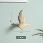 Effet 3D de l'oiseau en céramique sous différents angles de lumière