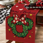 Détail des motifs festifs du chemin de table de Noël