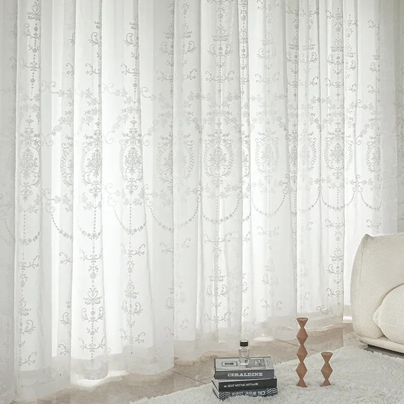Magnificent white embroidered tulle curtains for an elegant and bright interior