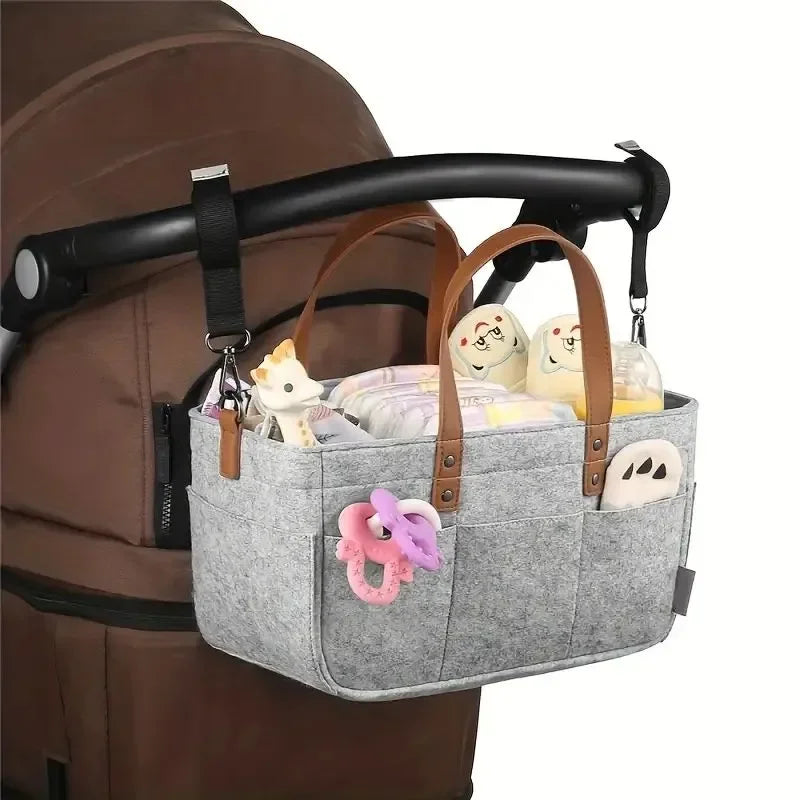 Sac à couches suspendu avec système de rangement pour accessoires de bébé