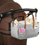 Sac à couches suspendu avec système de rangement pour accessoires de bébé