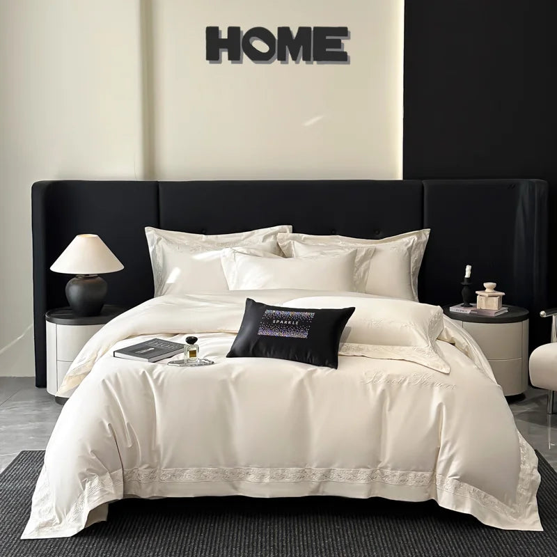 Détail de la broderie sur la housse de couette beige
