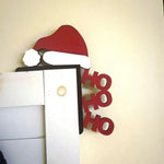 Ensemble de décorations de porte Noël en différentes couleurs sur une table