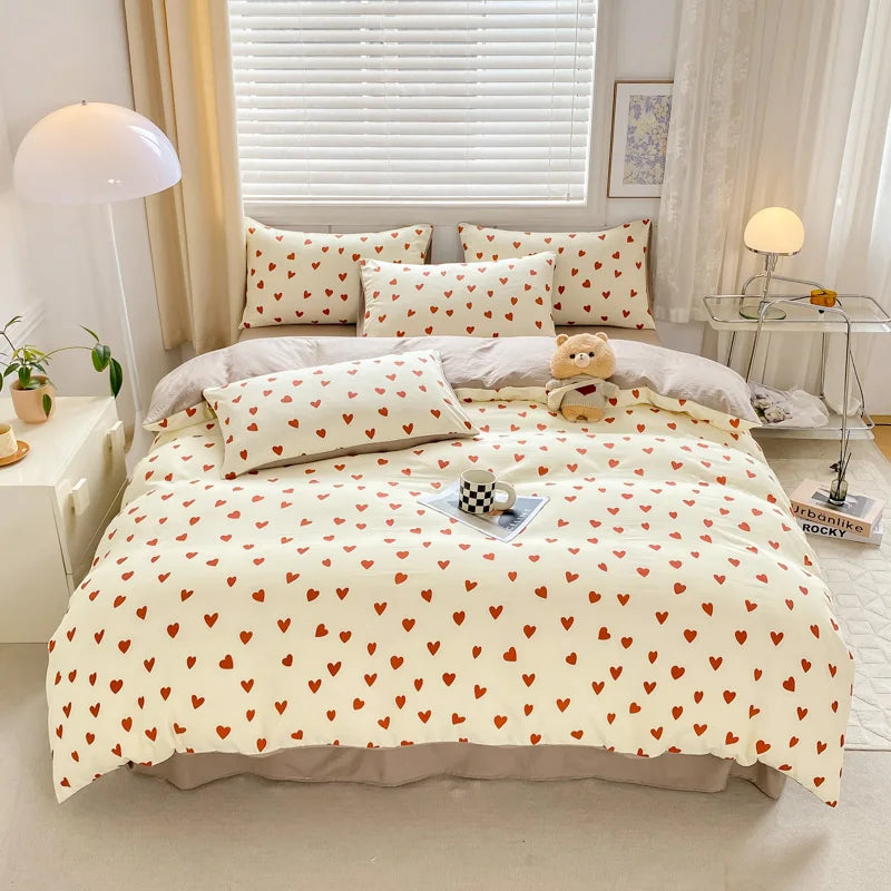 Housse de couette en forme de cœur rouge sur lit double