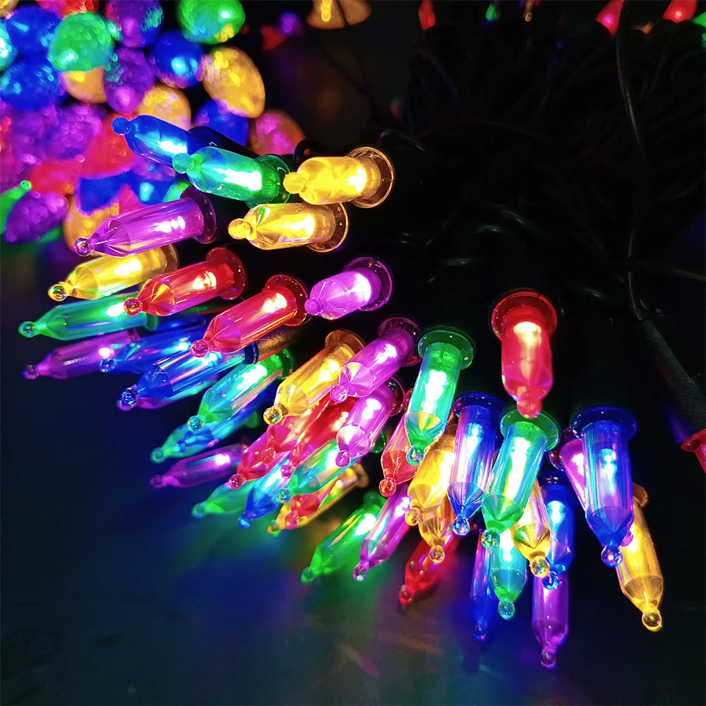 Décoration sapin Noël avec guirlande lumineuse