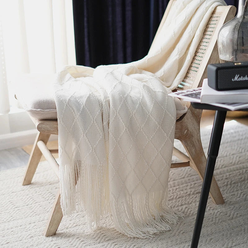 Couverture décorative verte avec pompons