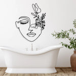 Décor mural métal femme de ligne dans une chambre à coucher élégante