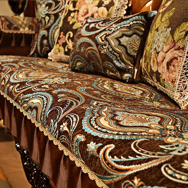 Cette magnifique couverture de canapé ornée de motifs géométriques et floraux en couleurs vives apporte une touche de sophistication et de chaleur à l'espace.