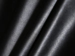 Détail de la matière cuir synthétique de la housse vert clair