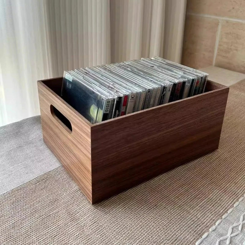 Collection de vinyles organisée dans boîte noire