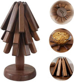 Dessous de plat en bois forme arbre plié sur table en bois