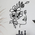 Décoration murale métal visage femme fleur noir