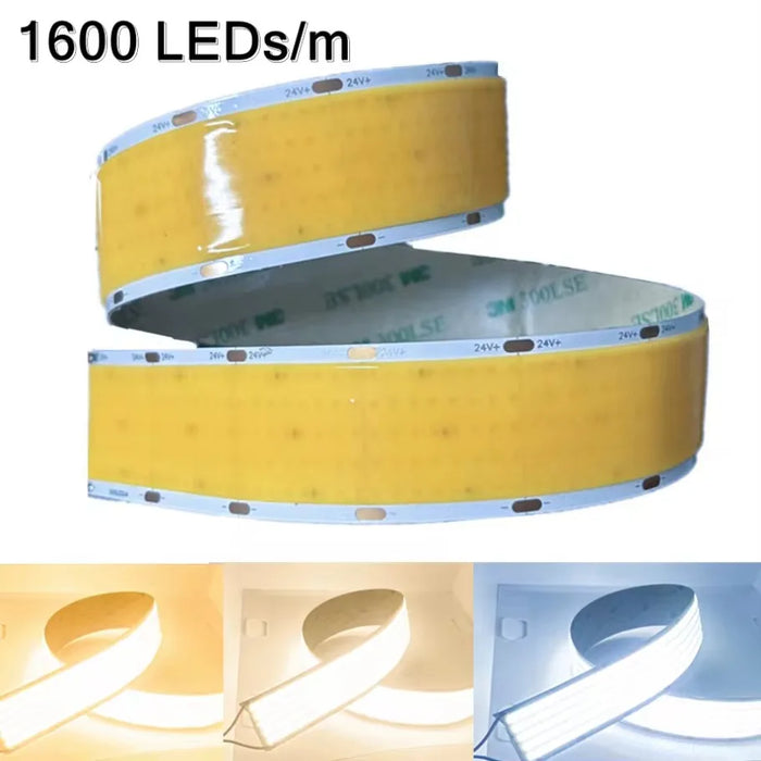 Ruban LED COB 24V ultra lumineux déroulé sur une surface blanche