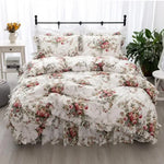 Parure de lit imprimée fleurs de jardin en coton 100% sur un lit King Size