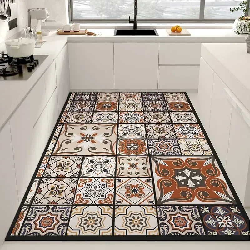 Un carrelage décoratif motifs floraux et géométriques dans une cuisine moderne, offrant une touche d'élégance et de personnalité à l'espace.