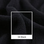Texture moelleuse et sombre d'un tissu noir.