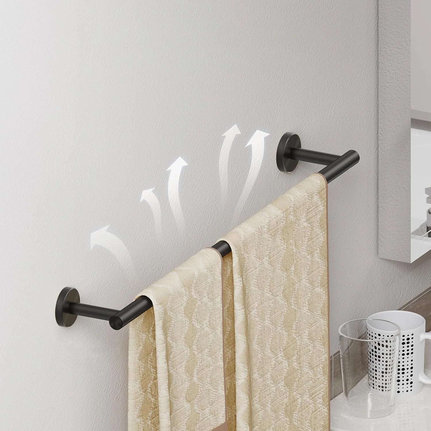 Barre de serviette noire installée dans une salle de bain moderne