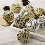 Boule de Noël léopard en tissu enveloppé saphir profond