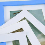 Cadre photo blanc avec photo de paysage